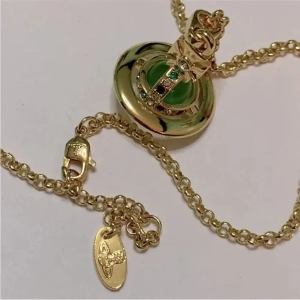 NIB Vivienne Westwood gold petite Saturn orb green crystal chain necklace